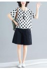 white dotted casual blended pullover and black elastic waist shorts